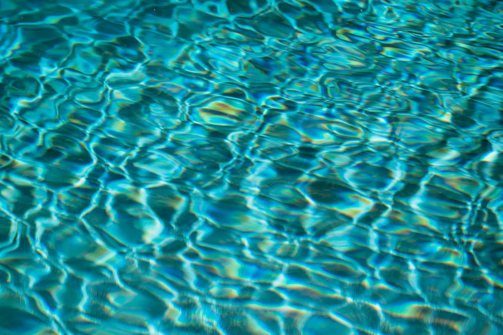 Close-up of clear blue pool water