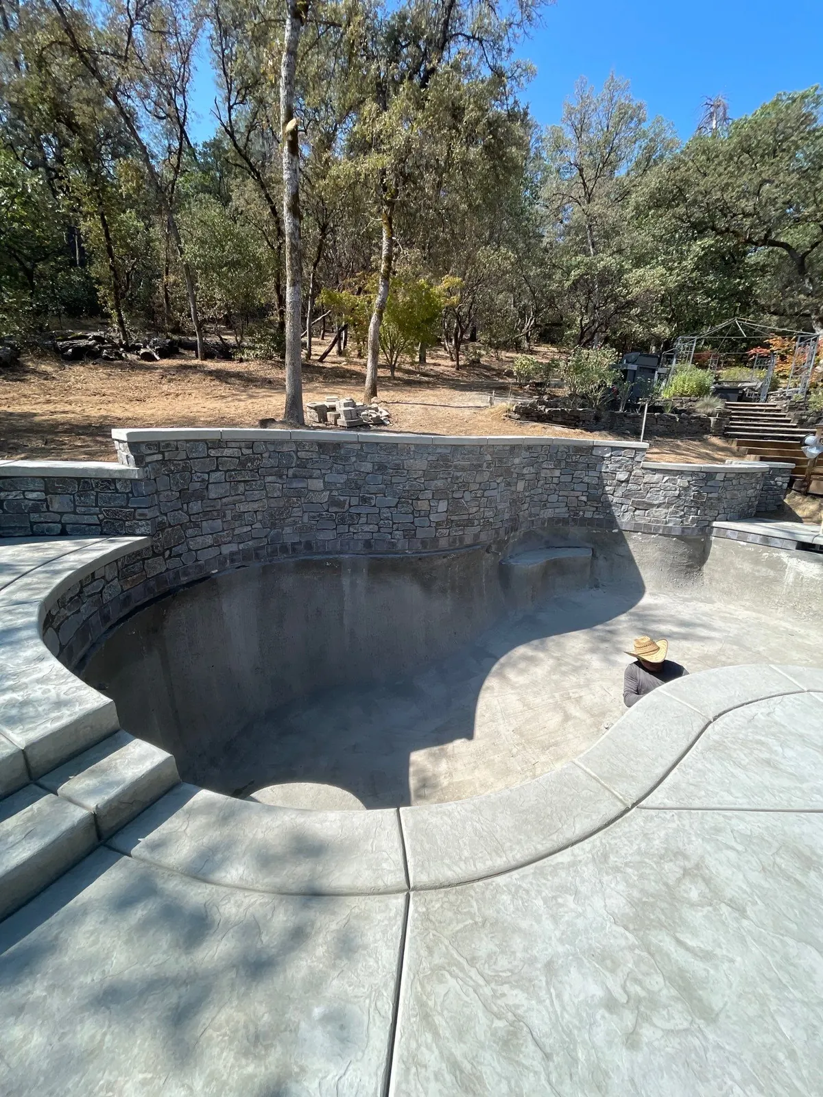 Masonry, stone, and tile phase of a CJR pool project, photo 24